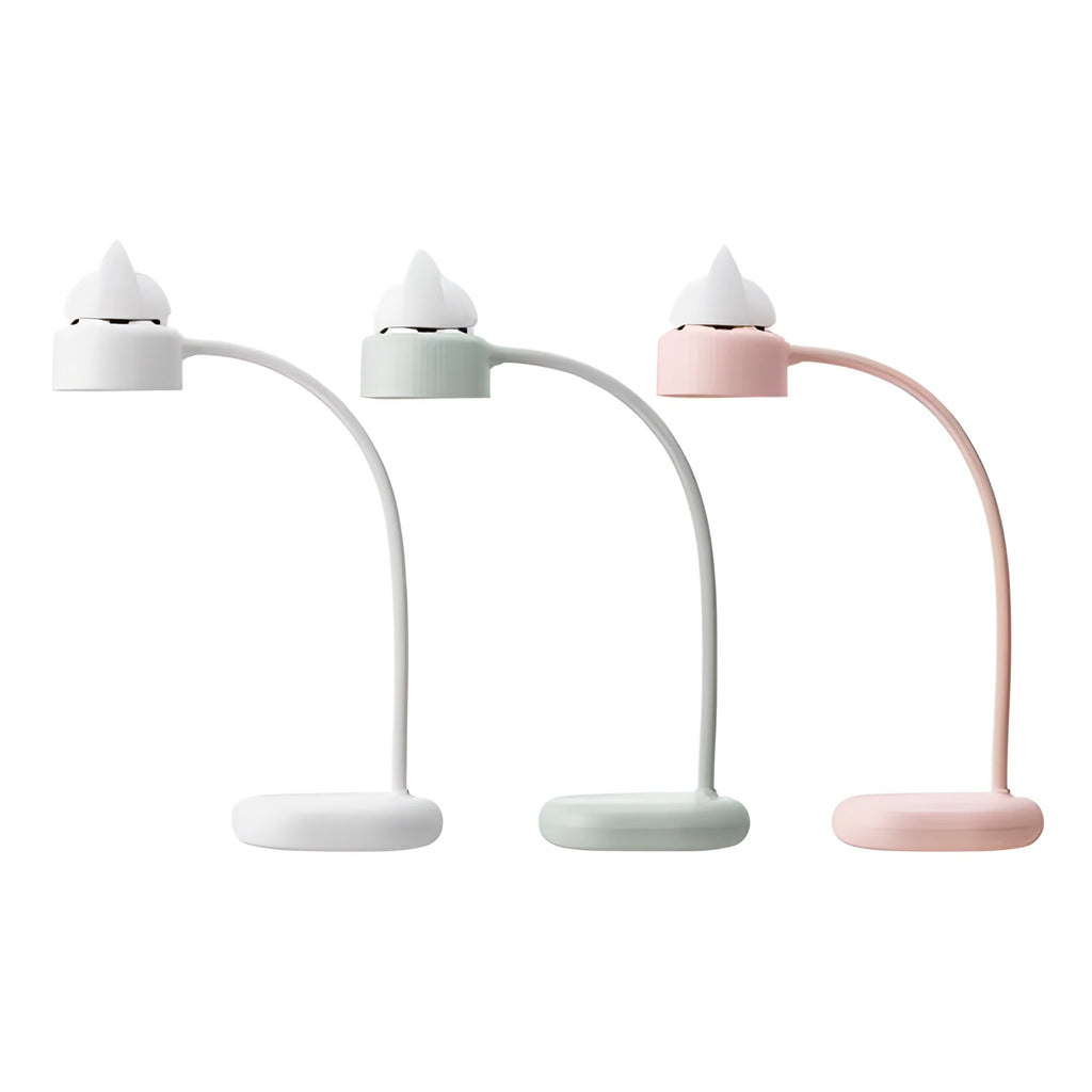Green LED desk lamp with clip base and touch controls on a wooden desk surface