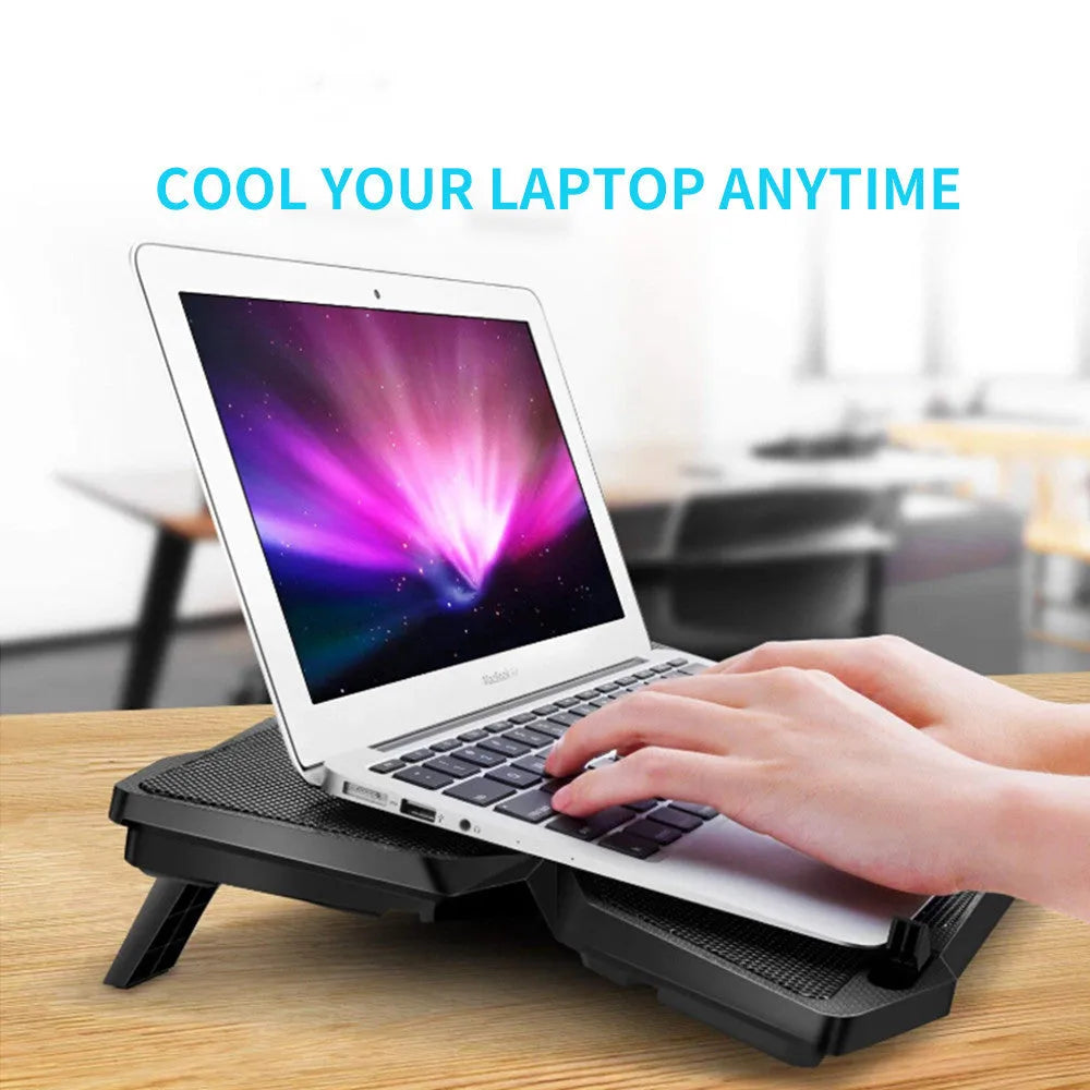 Blue computer cooling base with four LED fans and dual speed control switches showing two USB ports