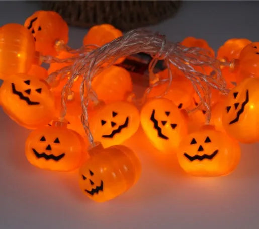 Halloween LED string lights with bat, pumpkin, and ghost pendants, waterproof for outdoor decoration
