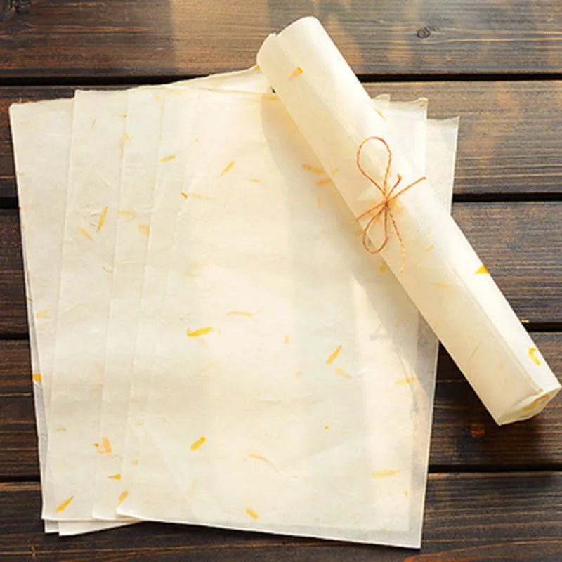 Ten sheets of Chinese ancient-style painting paper in green, red, and yellow designs, measuring 27.5 by 16.7 cm