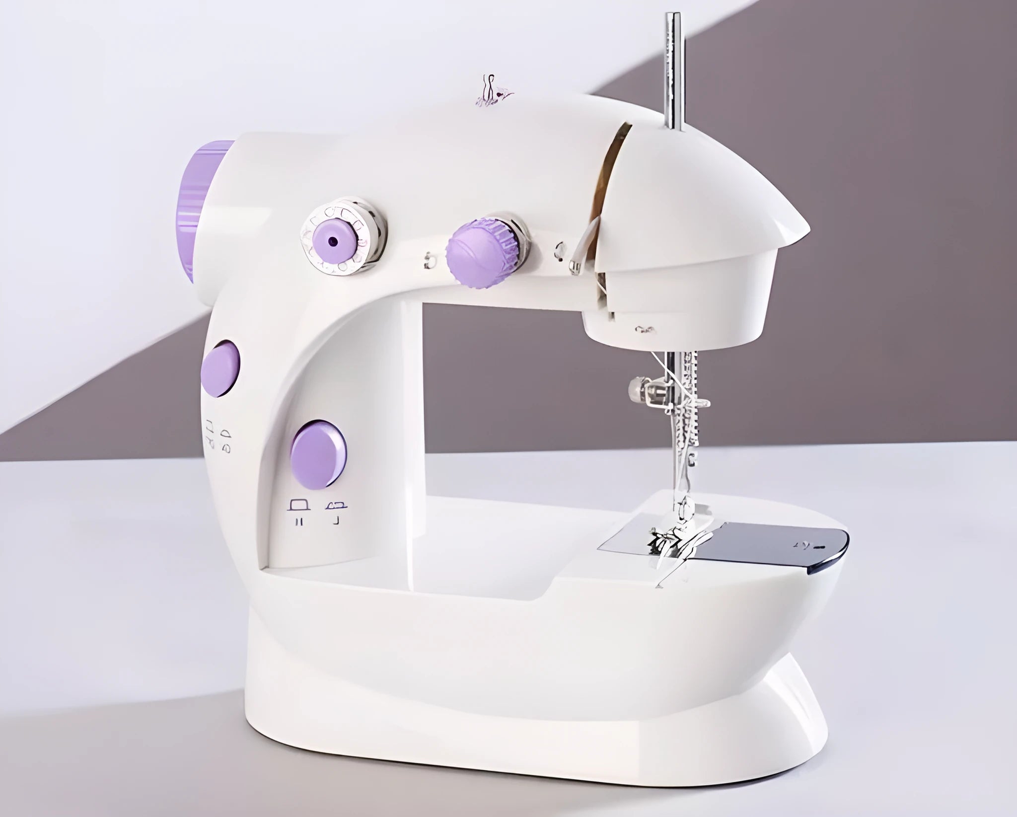 Miniature electric household sewing machine with compact 20cm design for basic garment repairs