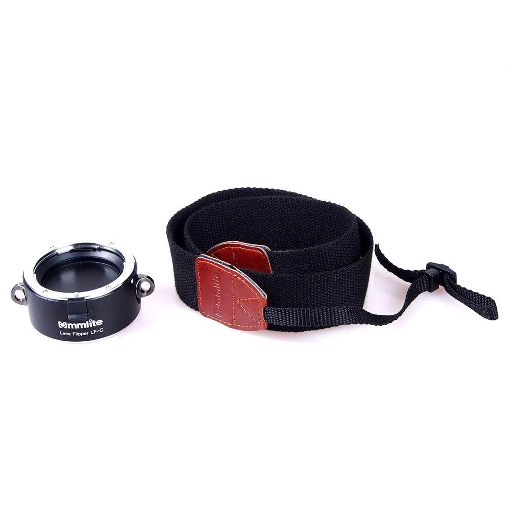 Aluminium alloy Nikon lens flipper holding two camera lenses with cotton shoulder strap
