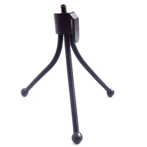 Mini tripod with universal ball head folded to 110mm size next to smartphone showing compatibility