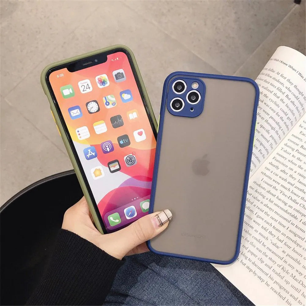 Solid colour silicone shockproof protective case for iPhone on a table.