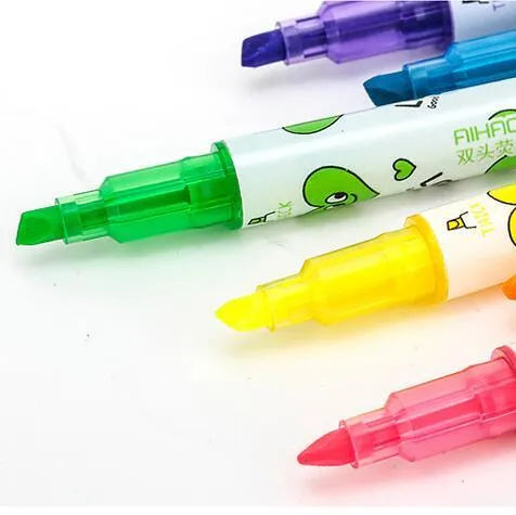 Set of six double-headed highlighter pens in pink, orange, yellow, green, blue, and purple colours.