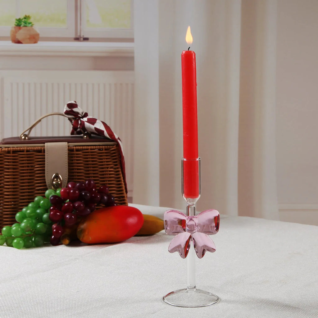 Handmade borosilicate glass bow candlestick holder with 2cm inner diameter and 7cm base, available in three heights