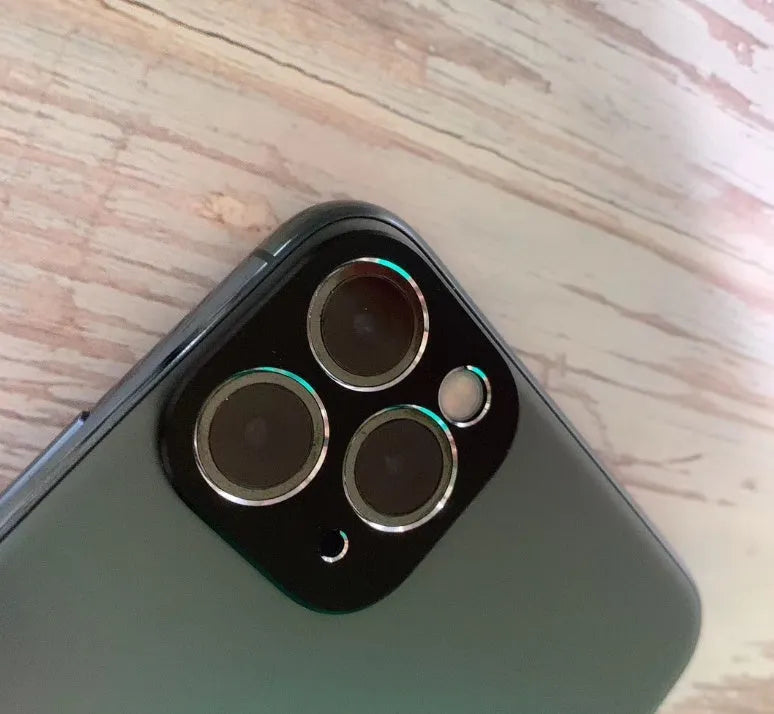 Metal lens protection ring for iPhone 11 and 11 Pro in various colours on a phone back cover