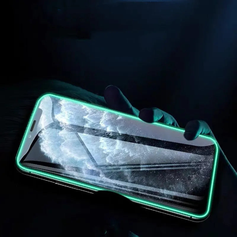 Luminous tempered glass screen protector glowing on iPhone in dark room with 9-layer protection diagram