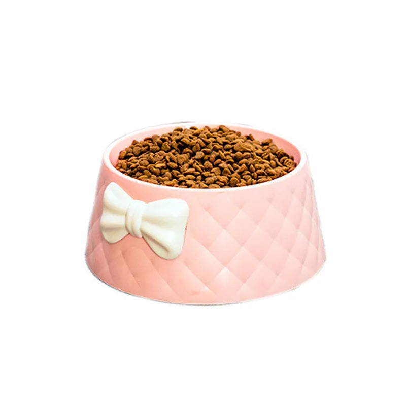 Bow-shaped cat bowl dog bowl in PP plastic, shown in pink, green, and grey.