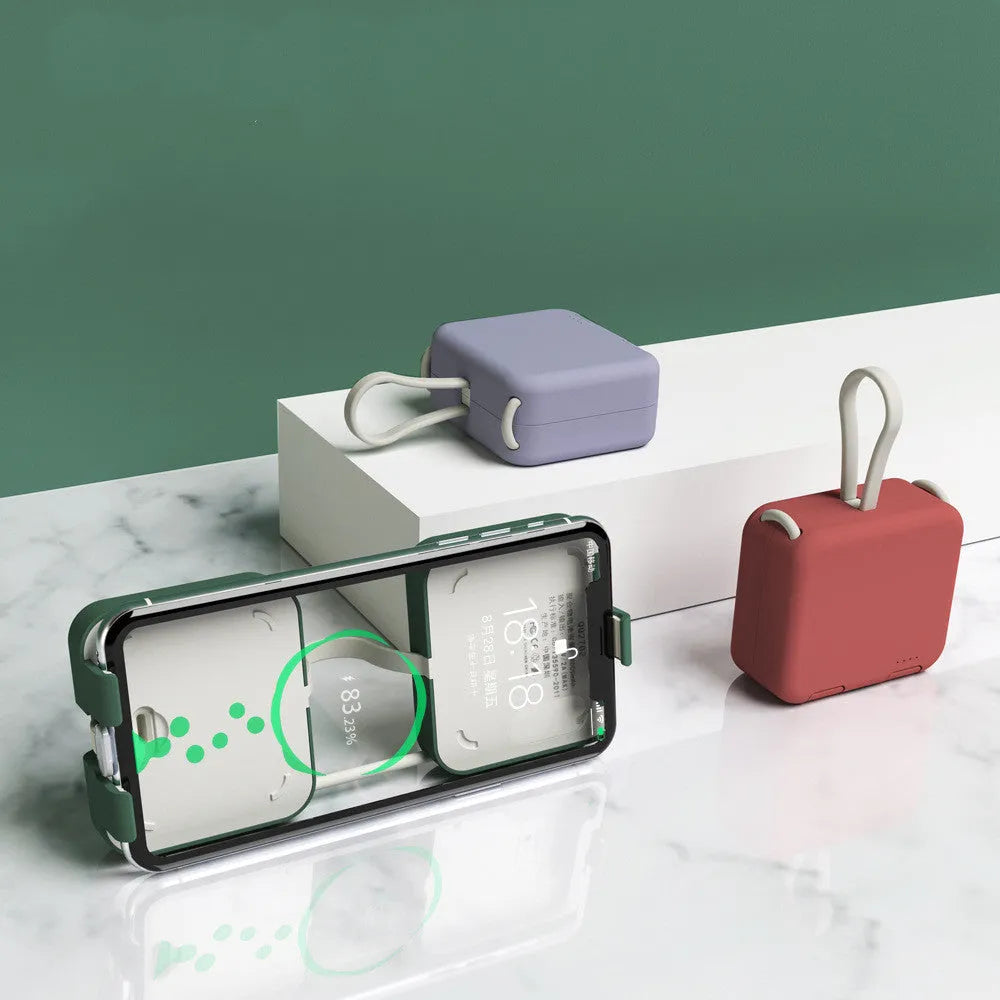 Handbag back clip power bank in four colours showing clip mechanism and dual charging ports
