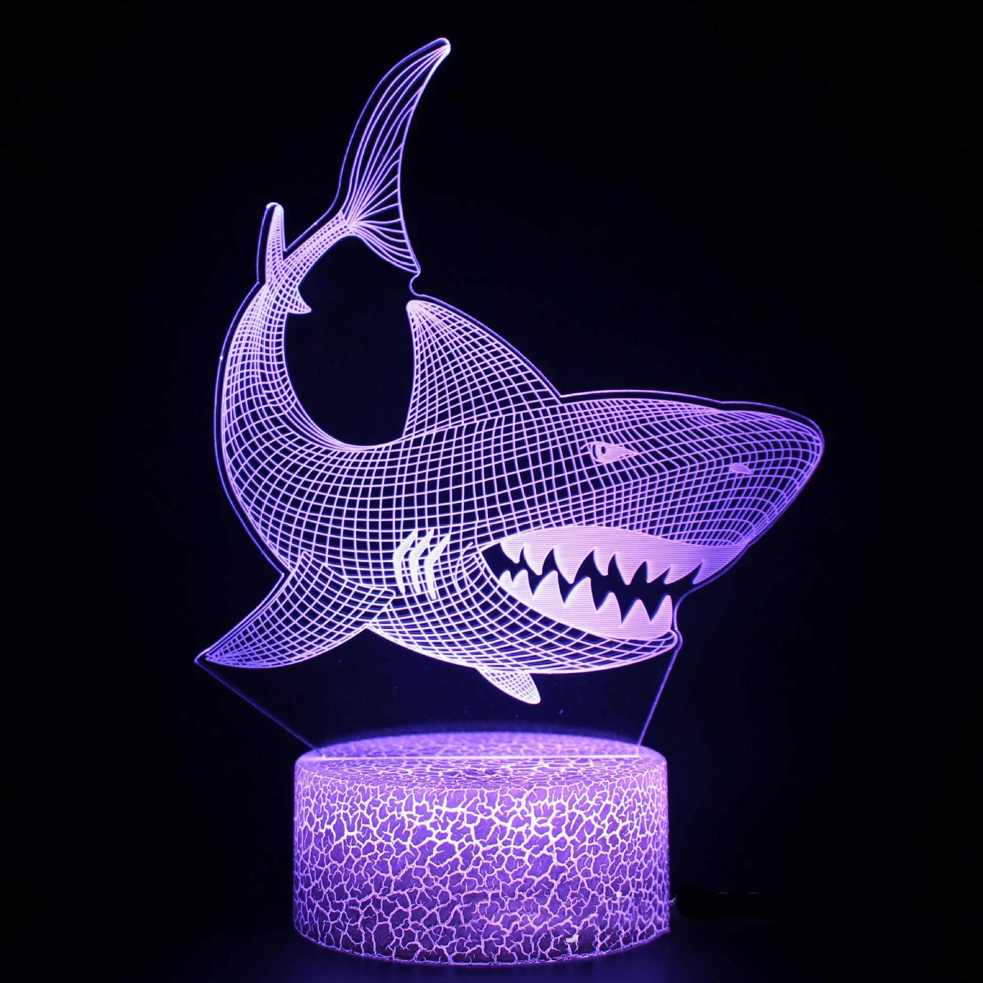 Shark Series 3D table lamp with acrylic plate and remote control on a table