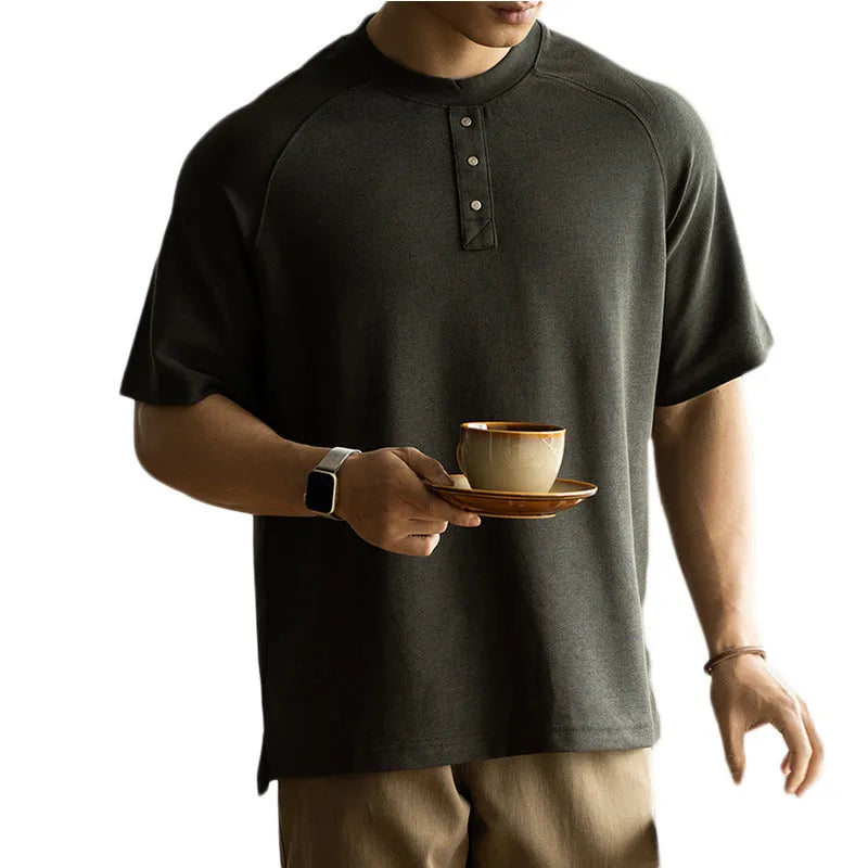 Casual pullover top with raglan sleeves in terry texture fabric showing loose fit and colour options