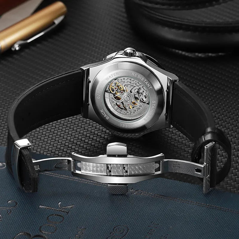 Automatic mechanical men's watch with hollow movement showing gears, diamond-studded markers, 16mm thickness, on leather strap