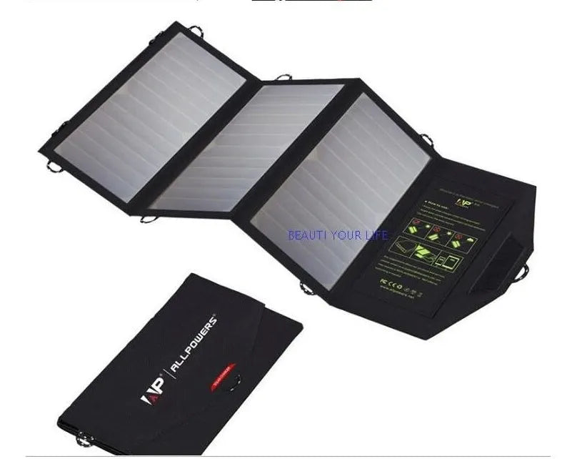 Black foldable solar panel charger with dual USB ports and backpack attachment loops