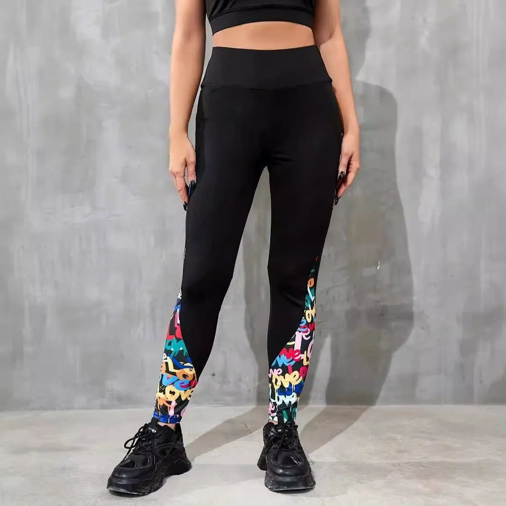 Women's black polyester yoga leggings with side pocket and leopard print pattern detail