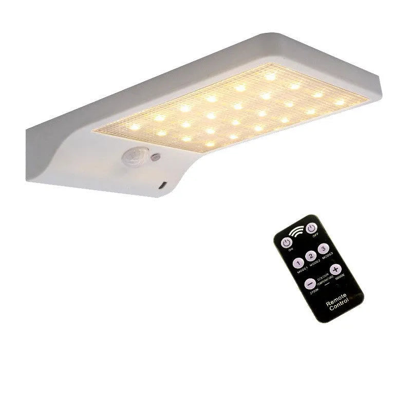 Solar garden light with solar panel and LED illumination for outdoor use in black or white colour
