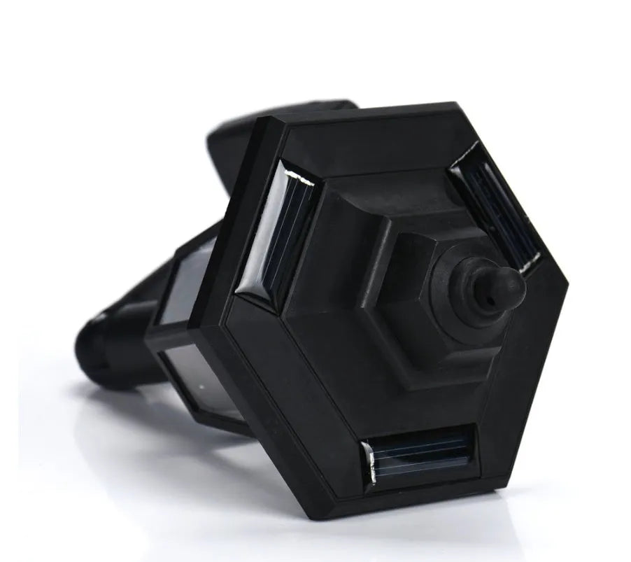 Black hexagonal solar-powered LED wall light for outdoor garden use.