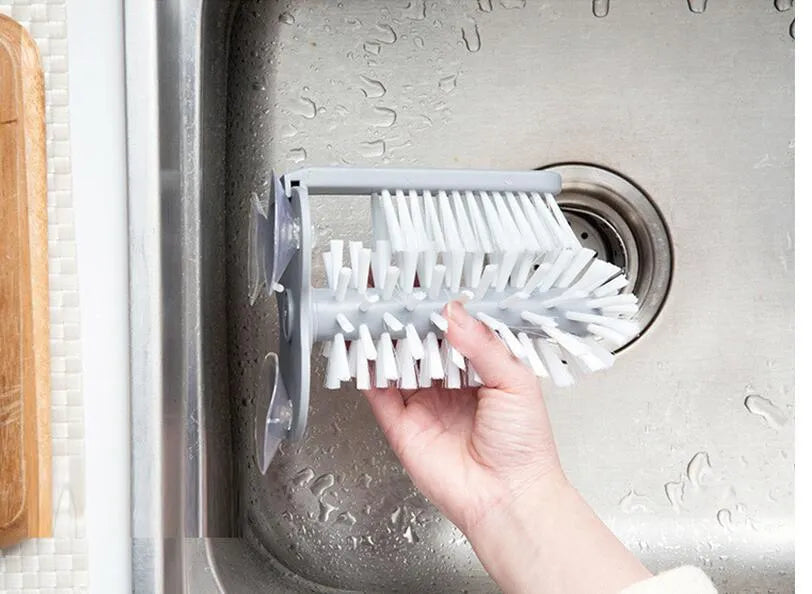 Grey rotating double-head cup cleaning brush with suction cups for wall mounting