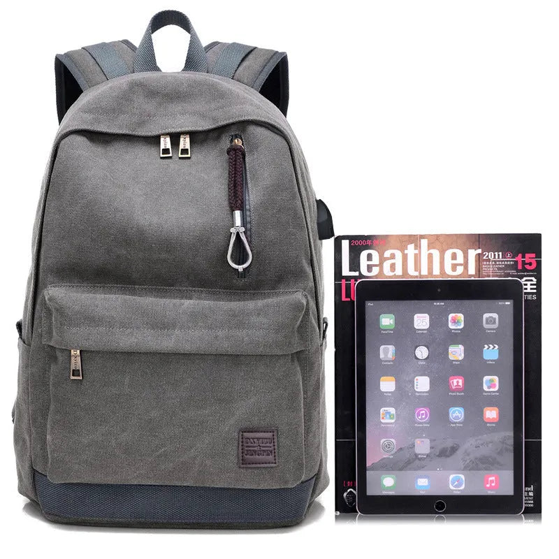 Canvas backpack with USB charging port showing front organisational pockets and adjustable shoulder straps