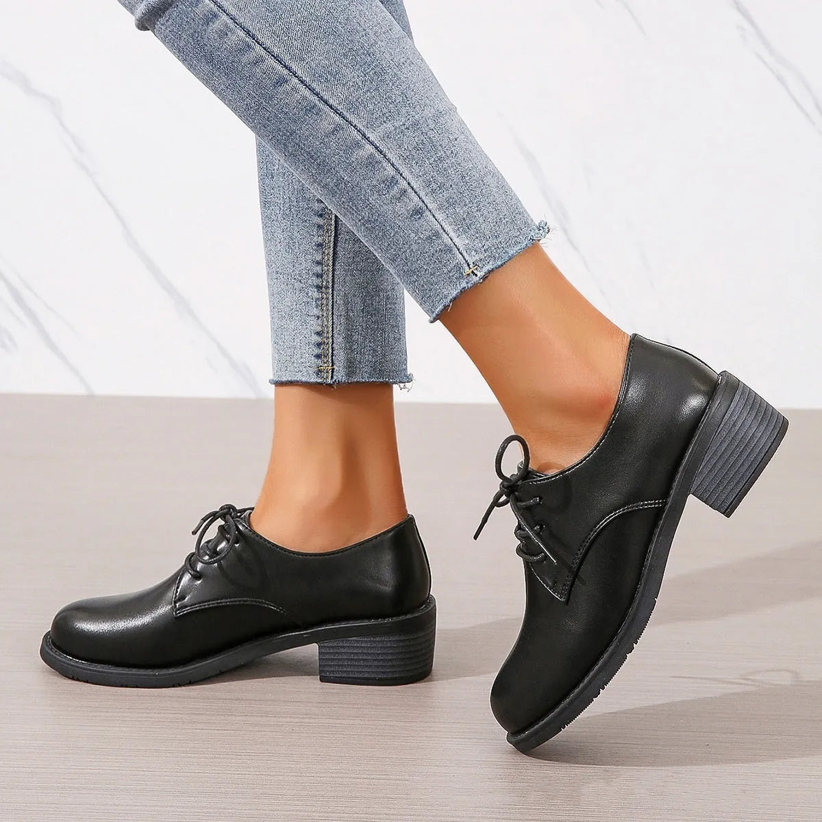 Black women's shoes with chunky 3-5cm heel, low-top design, and rubber sole for hiking