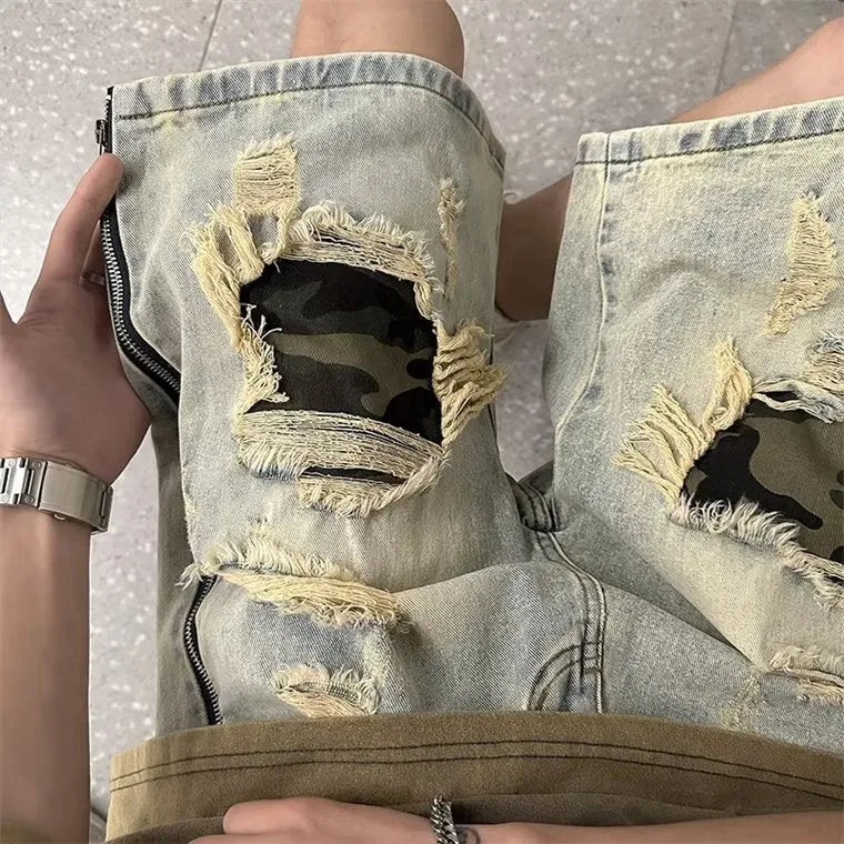 Men's yellow mud camouflage ripped denim shorts in a straight-leg style