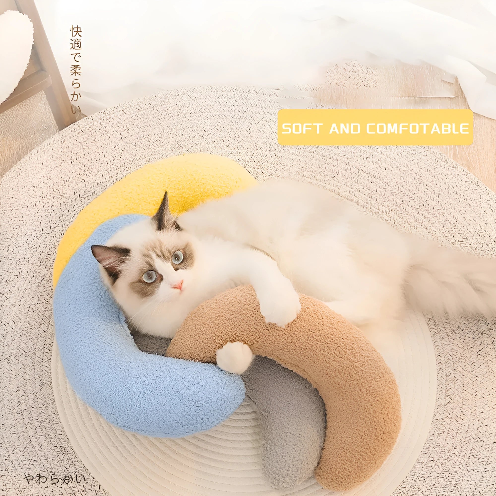 Blue U-shaped cat pillow with adjustable collar showing 30cm diameter measurement