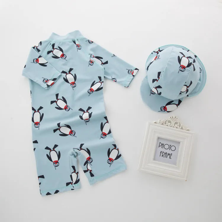 Boy's penguin print long sleeve swimsuit with matching swimming cap for beach sun protection