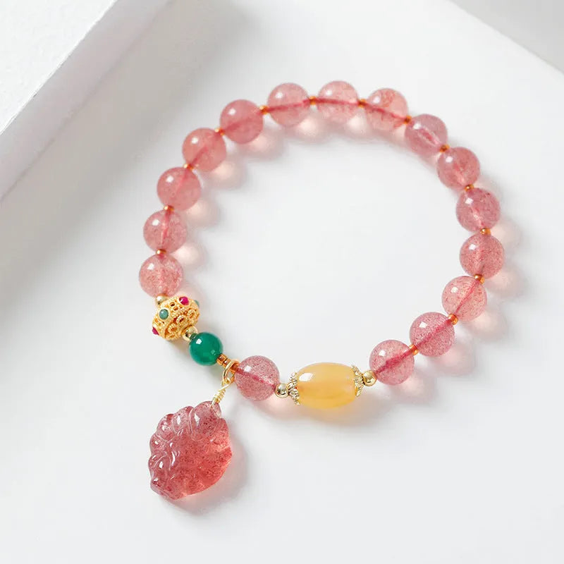Women's polished crystal bracelet with Nine Tail Fox beaded design on a wrist.