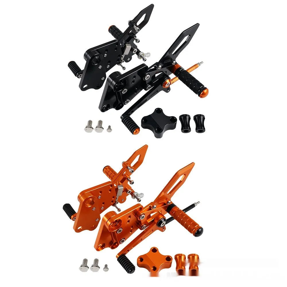 KTM Duke motorcycle rear shift pedal support assembly kit in black and orange.
