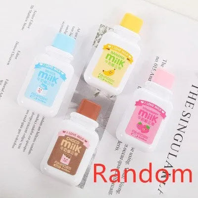 Creative bottle-shaped correction tape with decorative patterns showing curved comfortable design