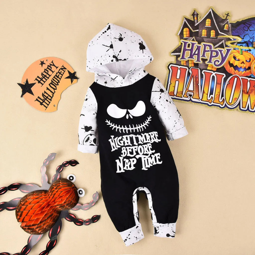 A black hooded Halloween romper costume with long sleeves for a child.