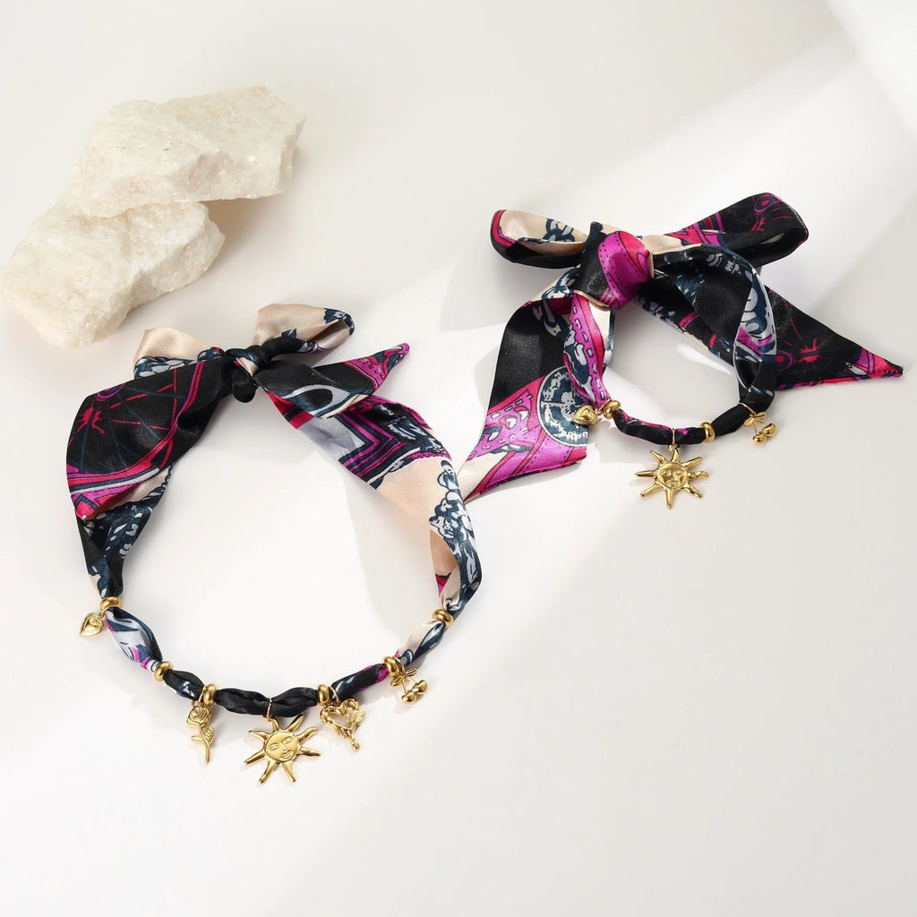 Stainless steel geometric pendant necklace and bracelet set with 18K gold-colour electroplated finish.
