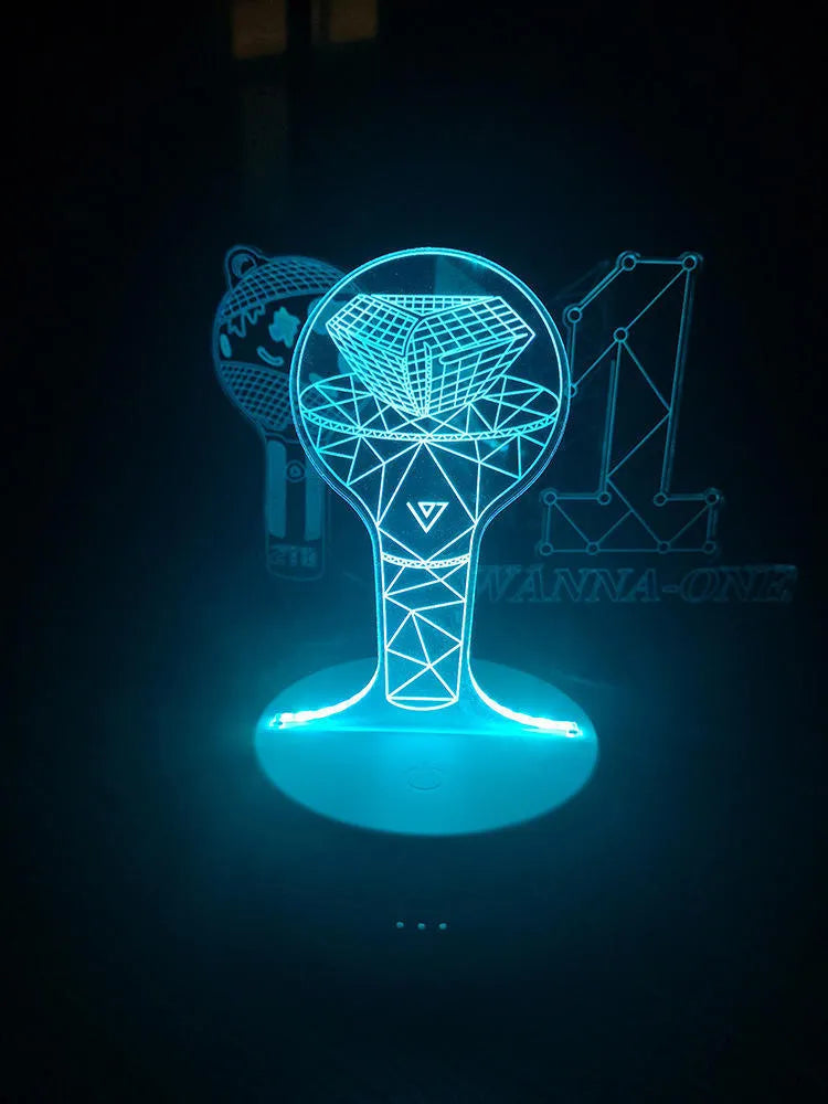 BTS-themed acrylic light-up display stand holding BTS Light 101 Tower Gem collectible