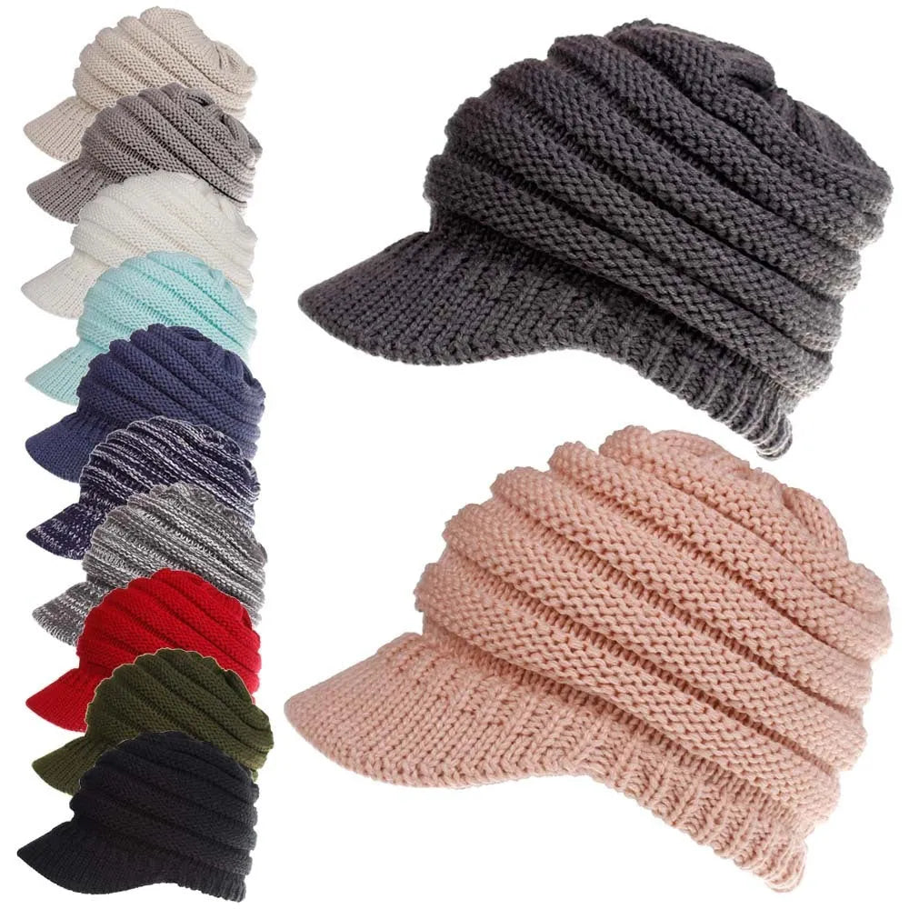 Women's soft acrylic knit ponytail beanie hat in assorted colours on a white background