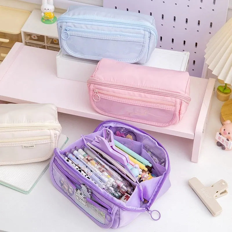 Ten-layer flip canvas pencil case in six colours showing open compartments with pens organised separately