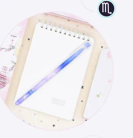 Box containing 12 constellation-themed plastic gel pens with quick-drying ink