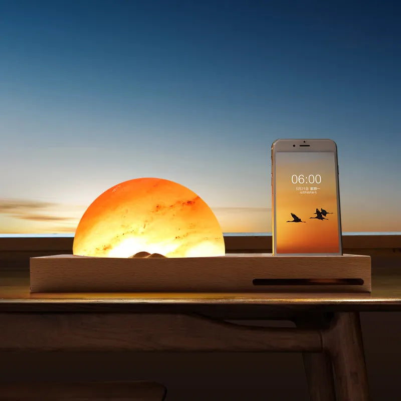 Wireless charging salt lamp with natural crystal salt shade on a solid beech wood base.
