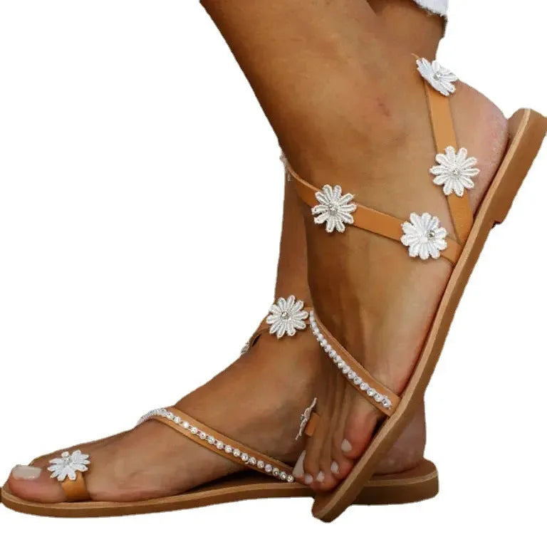 Brown ladies casual beach Roman sandals with herringbone toe and floral pattern on artificial PU upper