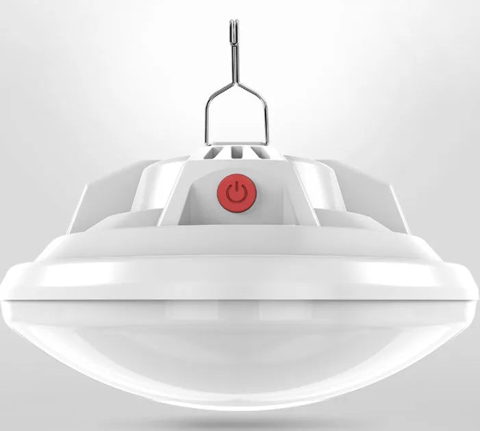 Rechargeable LED multifunctional camp light with 18650 battery on a table.