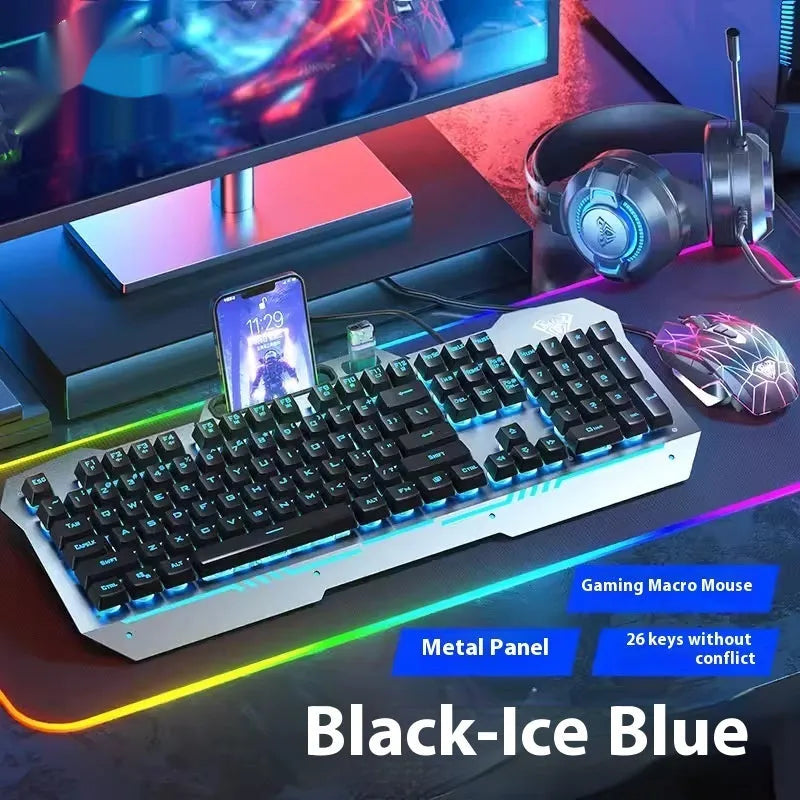Black mechanical keyboard with colourful backlighting, mouse, and headset on metal frame