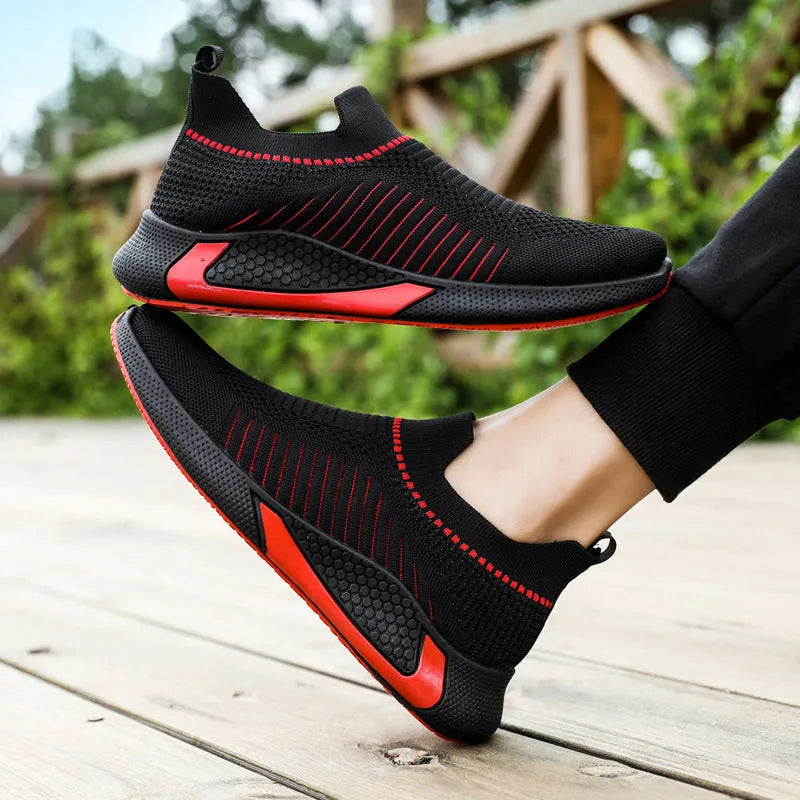 Men's mesh sock shoes with striped design, Flyknit upper, and plastic sole in black-white colour, size 42