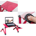 Adjustable folding laptop table stand in black with mouse panel, 42 x 26 cm surface, and built-in USB fan