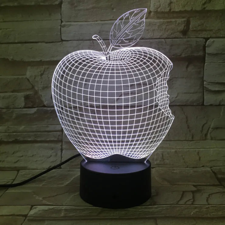3D fruit colourful night light with touch control, acrylic shade, and seven LED colour options on a table