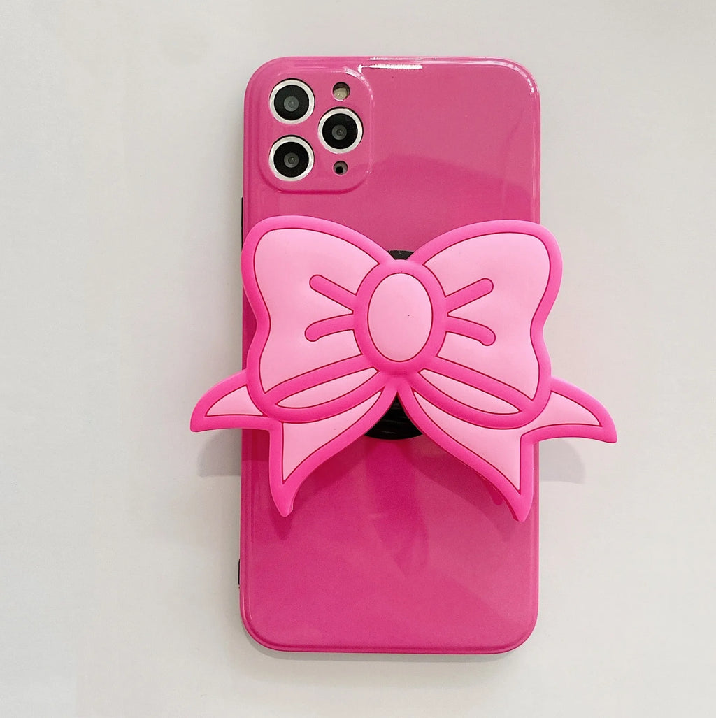 Rose Red iPhone case with pink bow design and a folded-out kickstand on the back.
