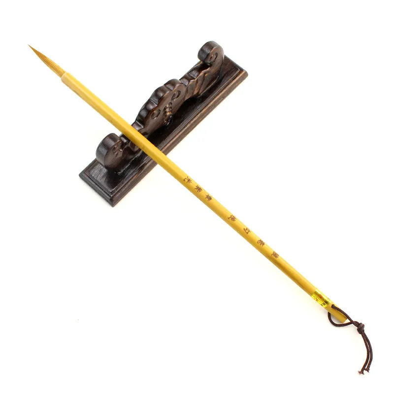 Langhao traditional Chinese calligraphy brush with wolf hair nib, shown beside ink and paper.