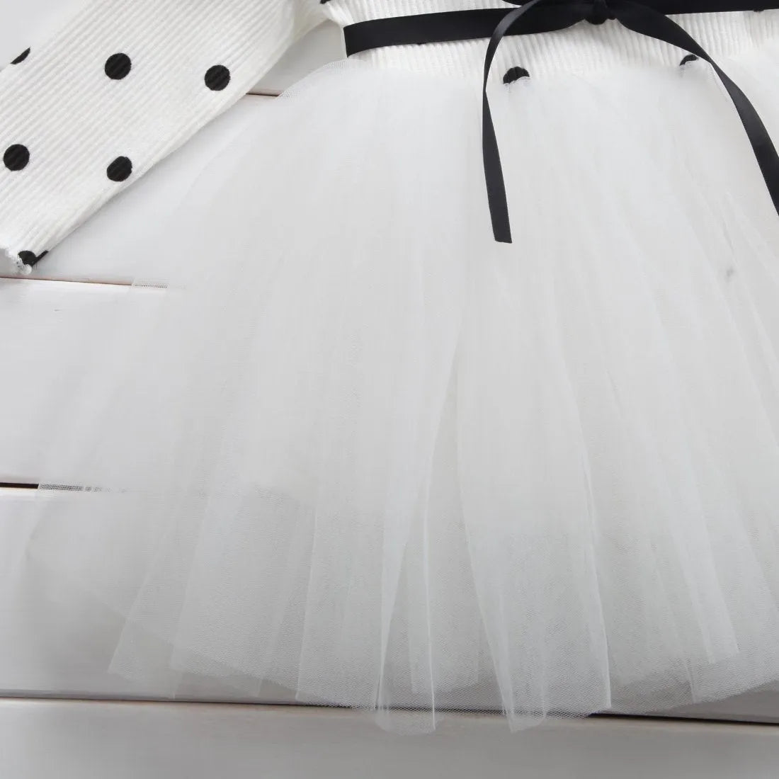 Baby girls long sleeve tutu lace dress with lace detailing, available in black, pink, white for ages 3-8 years