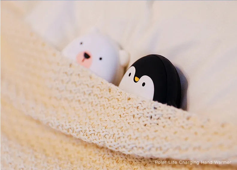 Cartoon penguin polar bear design USB hand warmer showing double-side heating and compact 83x78x35mm dimensions