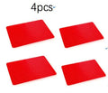 Red silicone pyramid cooking mat with grid pattern for oven and BBQ use