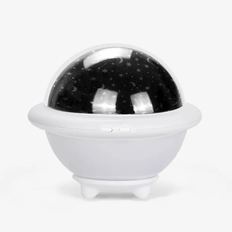 UFO-shaped starry sky projection lamp in green colour with dimensions 15.1cm by 15.1cm by 13.2cm