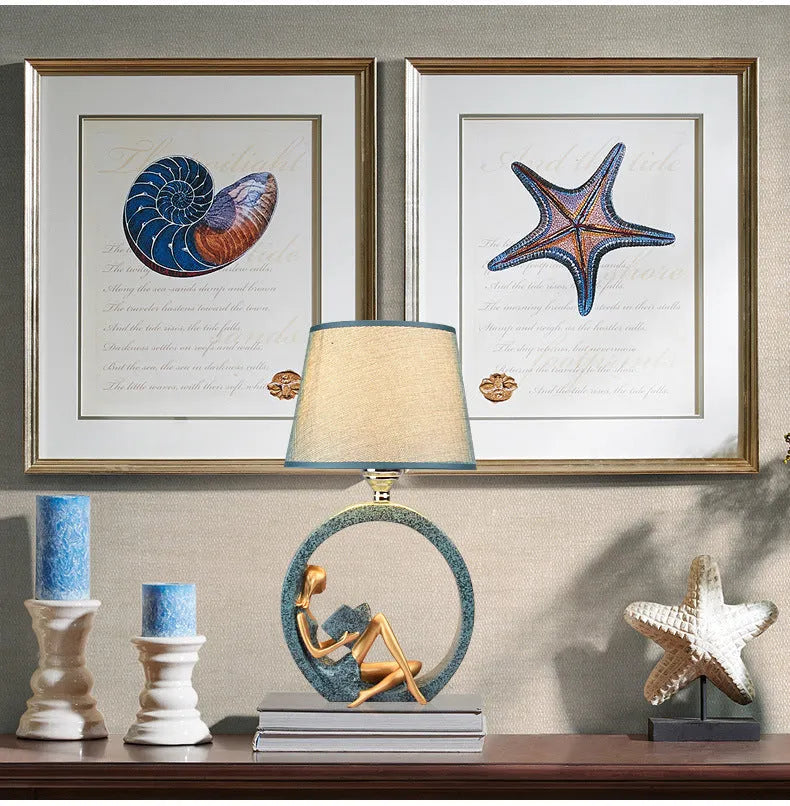 Blue reading girl table lamp in resin and cloth, 20 x 39.8cm, E27 fitting, for bedside or desk use
